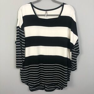 1775 black and cream striped top